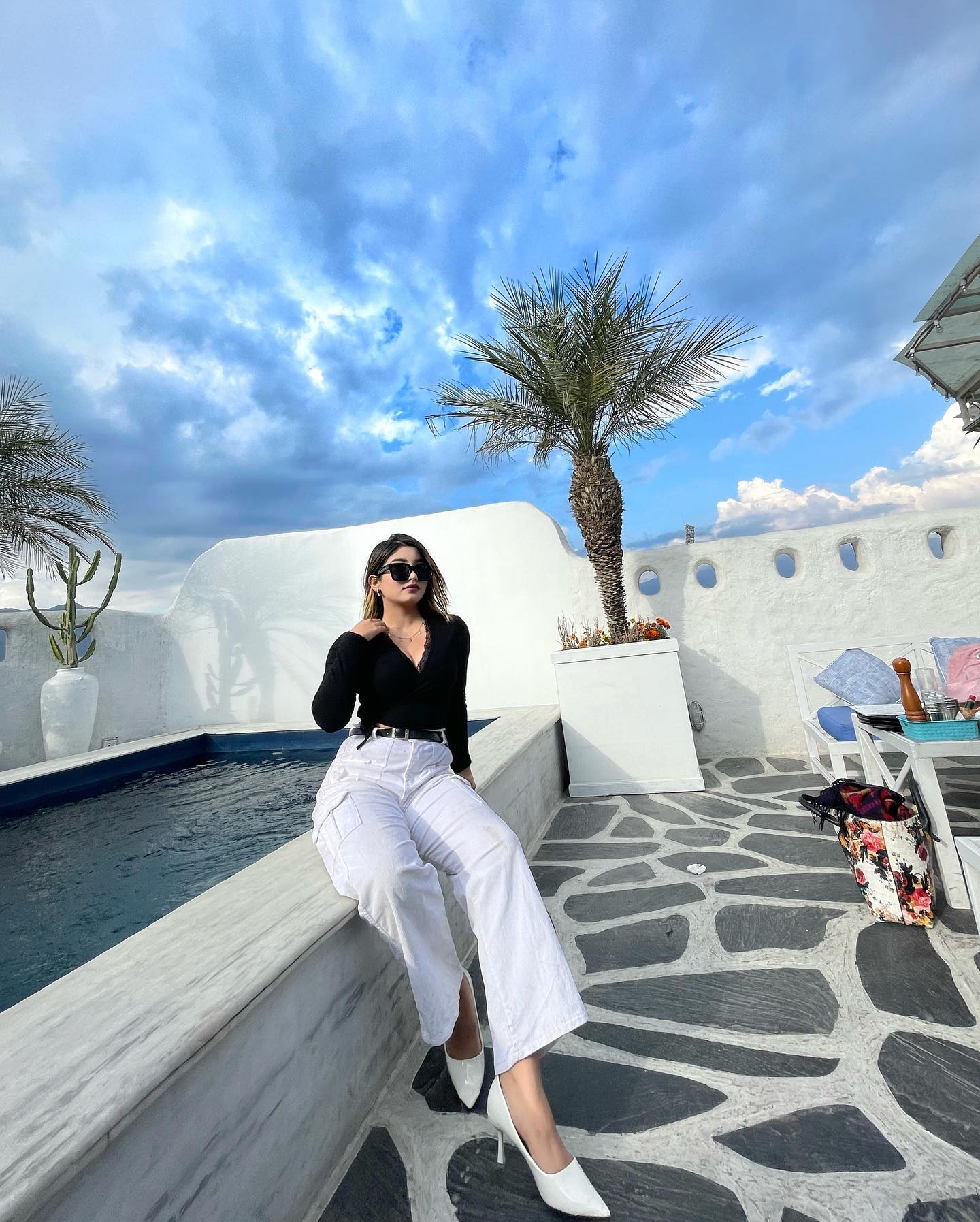 Sandhya in lifestyle setting by the pool, authentic content creation